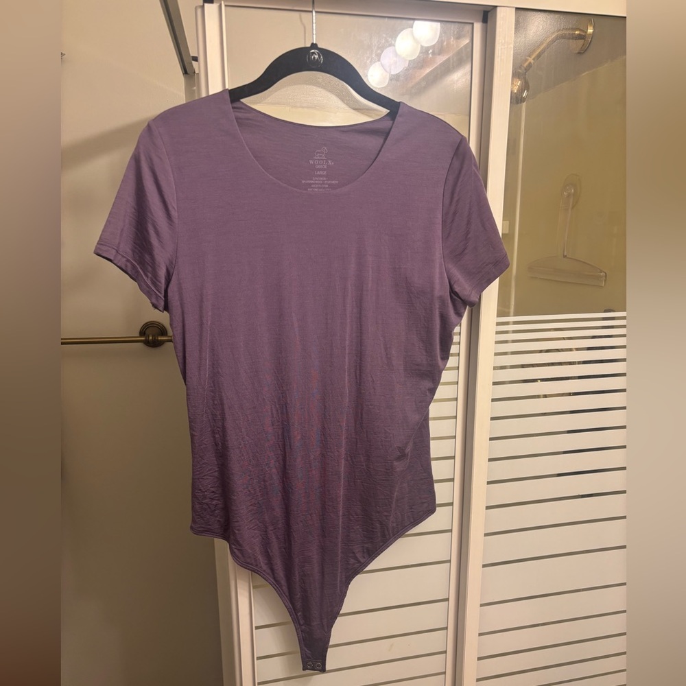ITEM HAS SOLD Woolx Gracie short sleeve bodysuit size large in Montana Grape